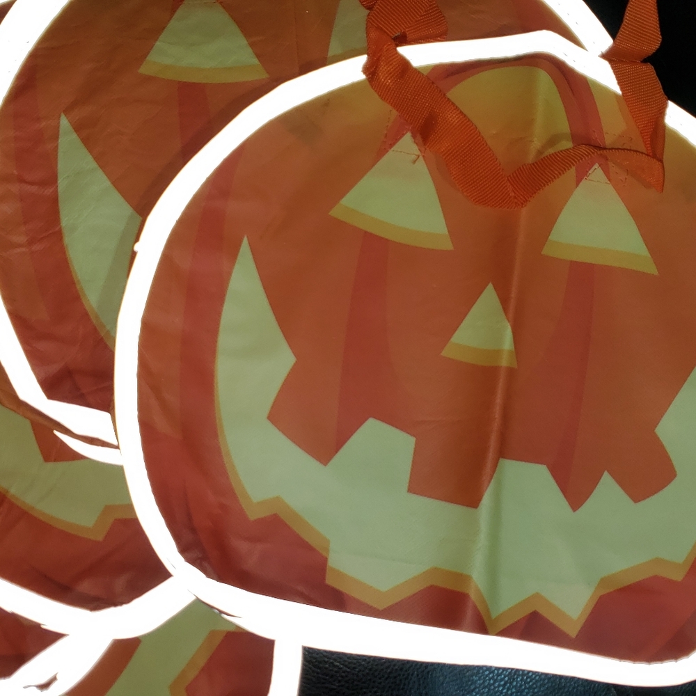 It's a bundle- 5 - Brand new glow in the dark Halloween bags